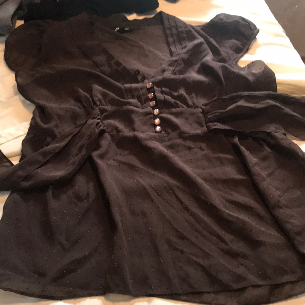 Dress shirt that ties in a back
